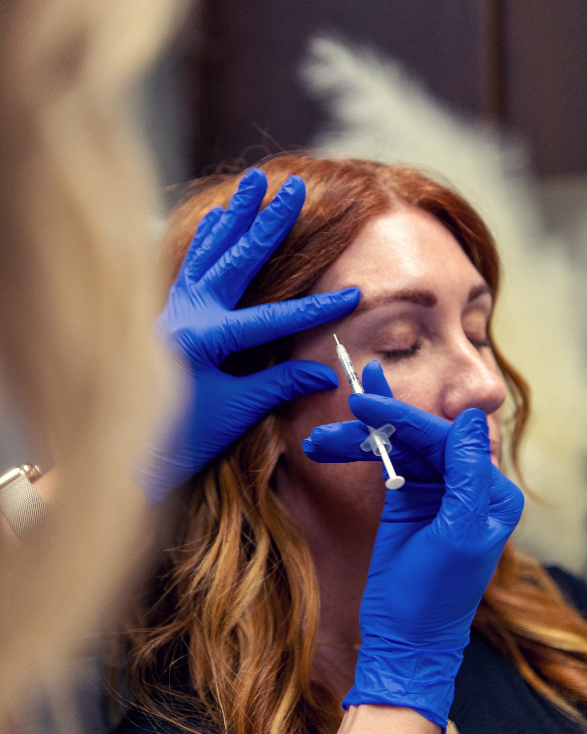 Dysport injection treatment being performed by a medical provider at Adorne Medical Aesthetics in Lewis County.