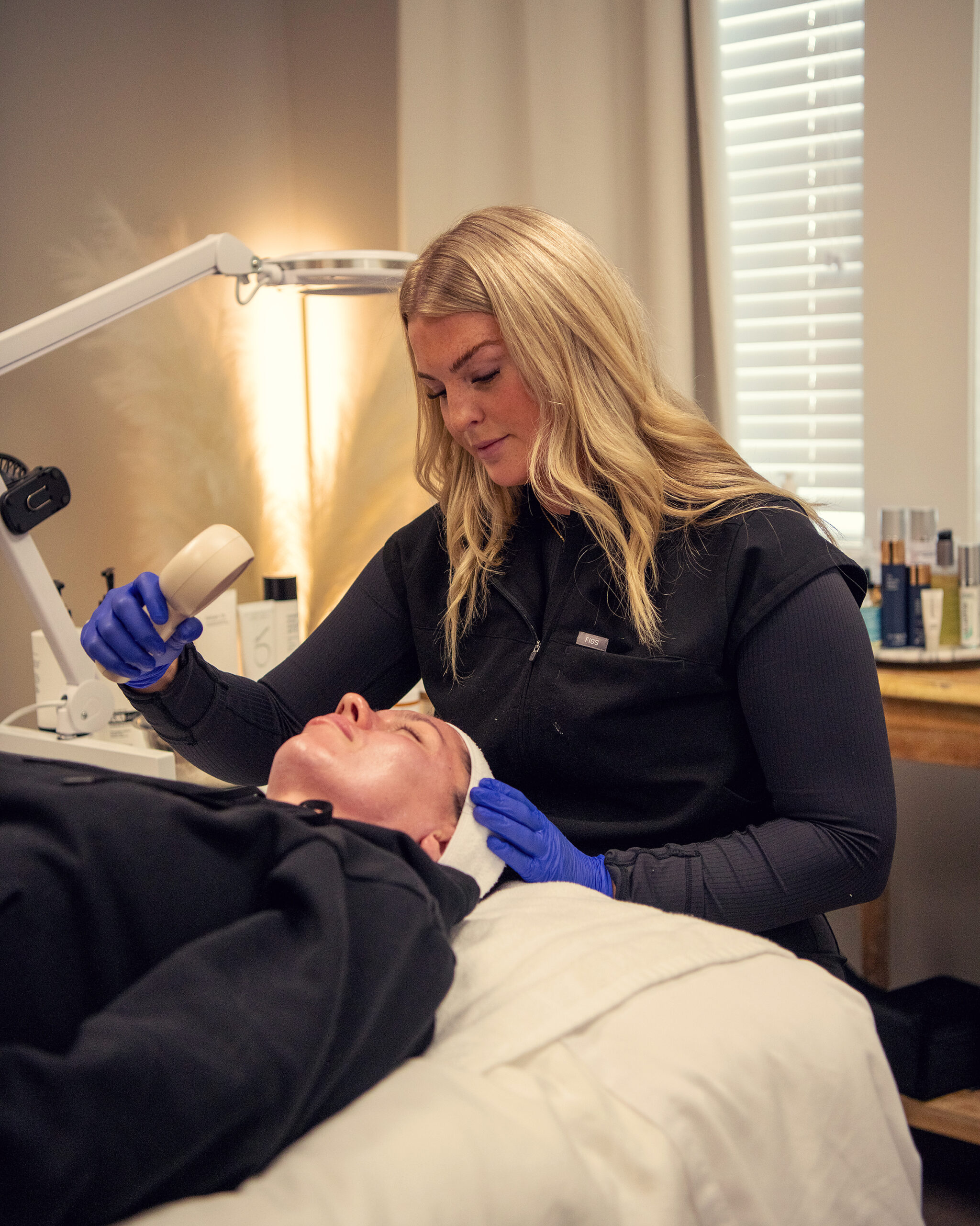 Medical provider performing a winter-focused facial treatment at Adorne Medical Aesthetics in Lewis County, Washington.